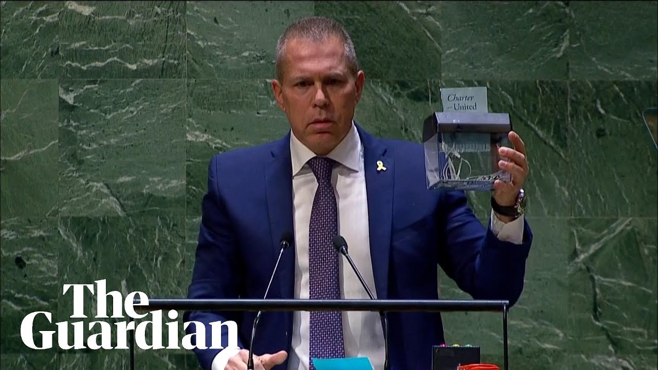 UN votes to back Palestinian membership, prompting Israeli envoy to shred charter