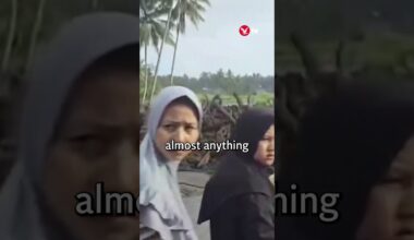 Houses submerged after cold lava landslide in Indonesia #shorts