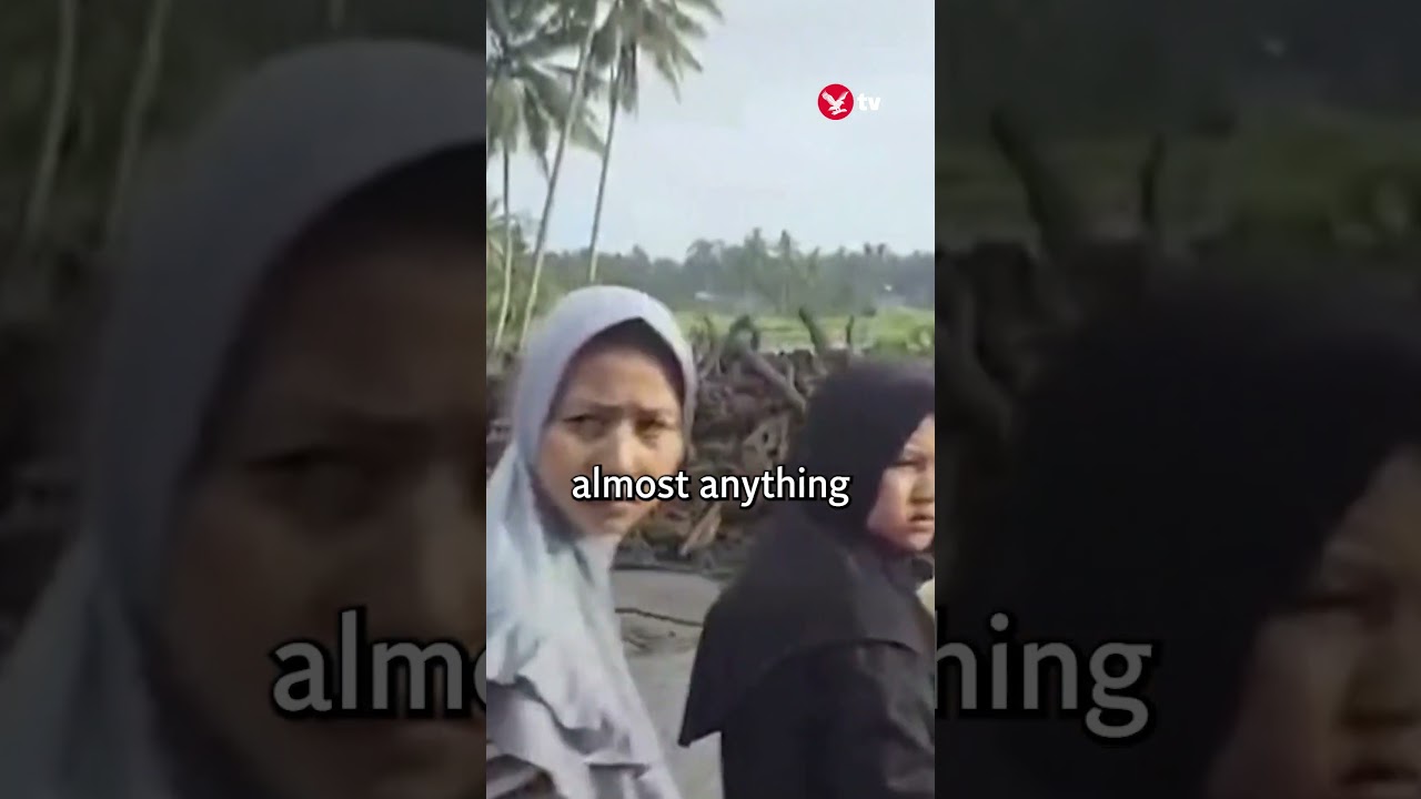 Houses submerged after cold lava landslide in Indonesia #shorts