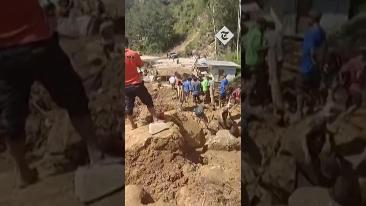 Villagers march with shovels to clean up landslide-hit areas of Papua New Guinea