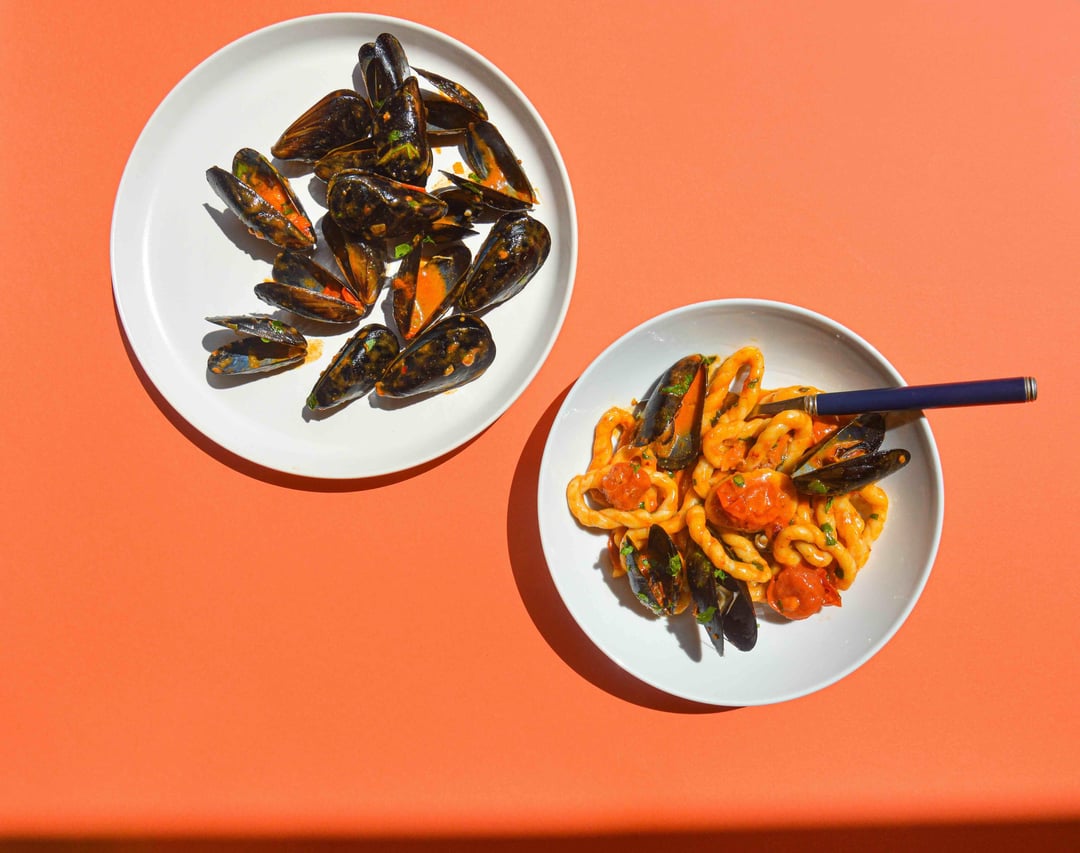 lorighittas served with mussels, nduja and cherry tomato sauce - a recipe for a homemade pasta