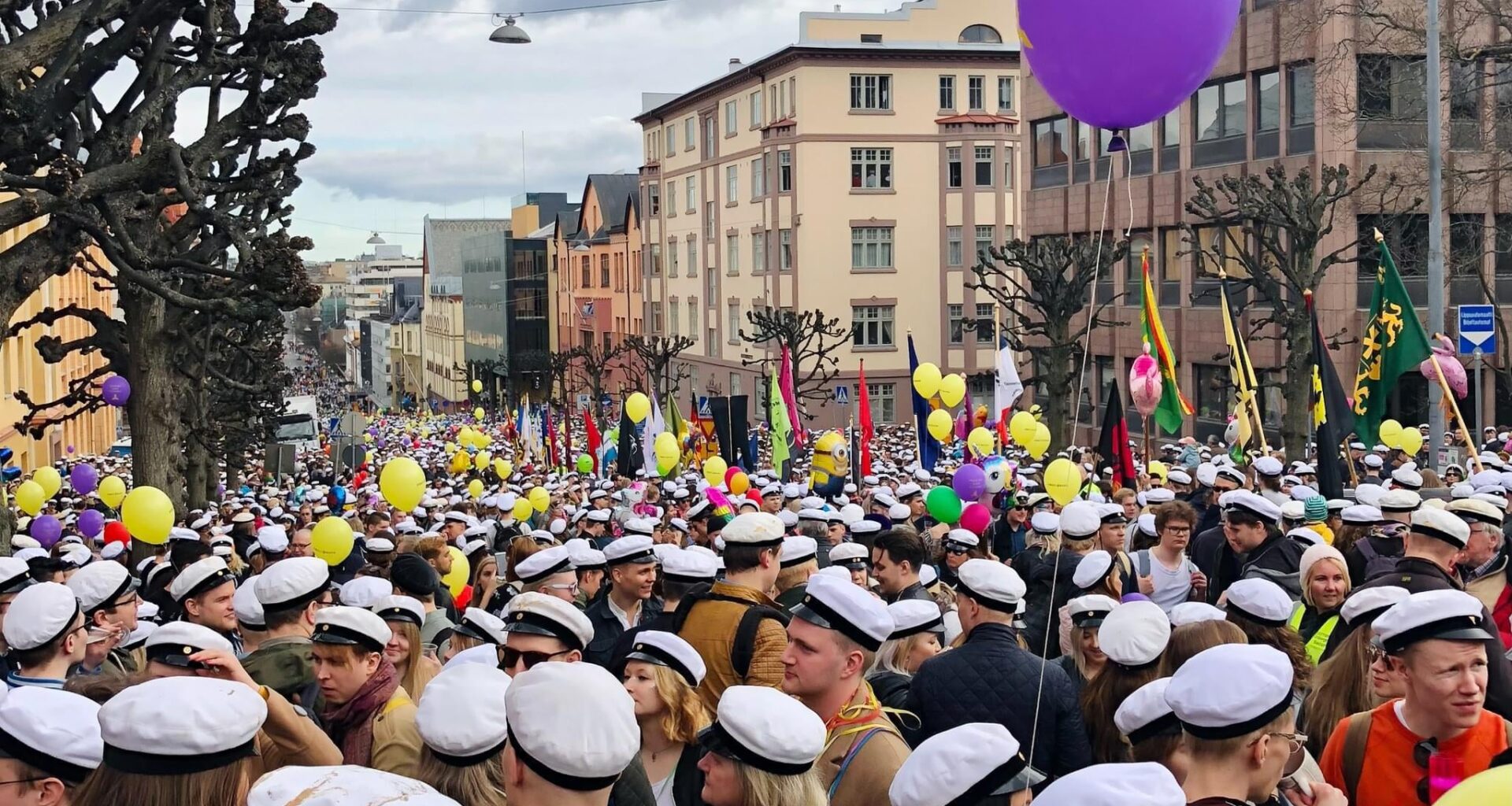 Vappu - people carrying flags