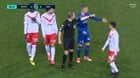 [Colin Millar] A dark night for Troyes. Their home match vs Valenciennes is abandoned as fans throw flares onto pitch, and some players throw them back into stands! Troyes are on the brink of successive relegations. Owned by the City Football Group, fans ironically chant "Merci City."