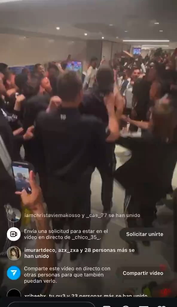 Real Madrid players celebrating winning La Liga.
