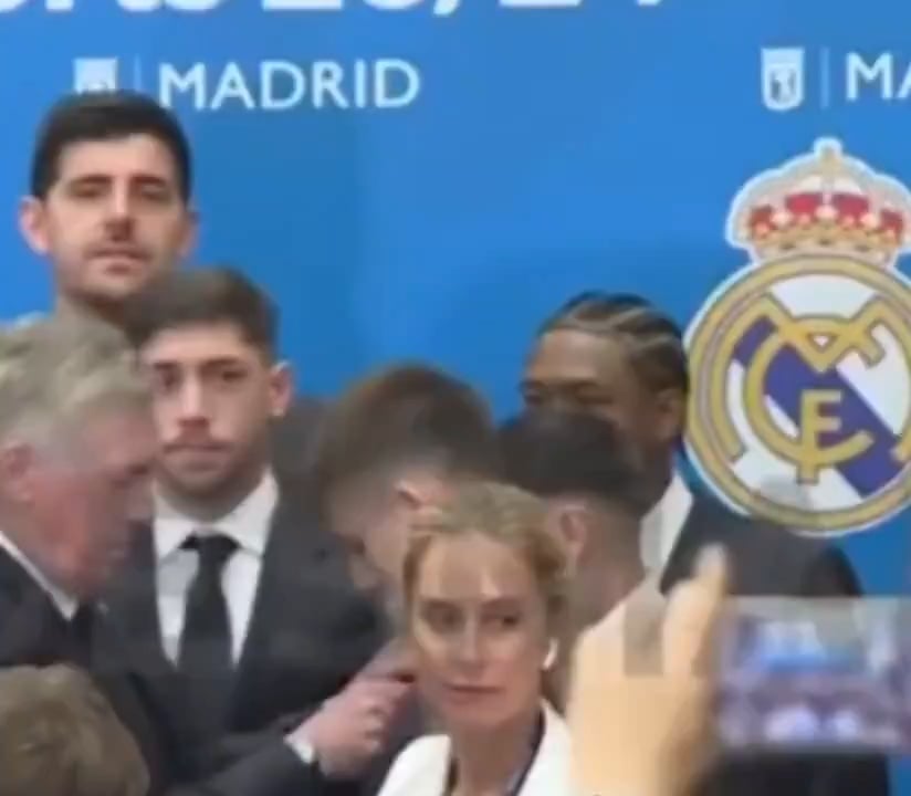 Carlo Ancelotti fixing Arda Guler's tie during the official ceremony of La Liga celebrations.