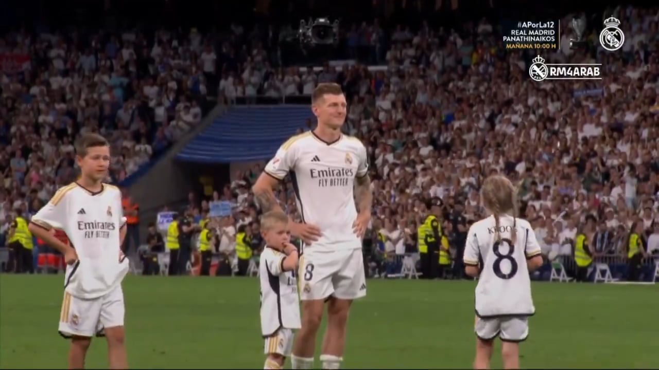 Toni Kroos goes in front of the Real Madrid fans with his children as he stands and cherishes the fans singing his name for the last time at Santiago Bernabeu.