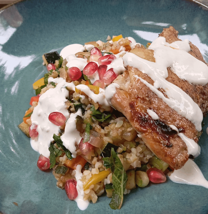 Bulgur with grilled and fresh veggies, chicken thigh, yoghurt-tahine sauce