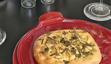 Focaccia made from leftover pizza dough (in addition to the obligatory rosemary, we also like to add a little sage)