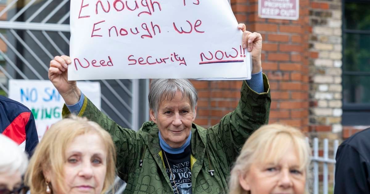 ‘It is becoming a living hell’: residents of Dublin housing complex protest against anti-social behaviour
