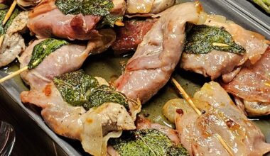 Saltimbocca with early potatoes roasted with thyme, rosemary and sage fresh from the garden, and green asparagus