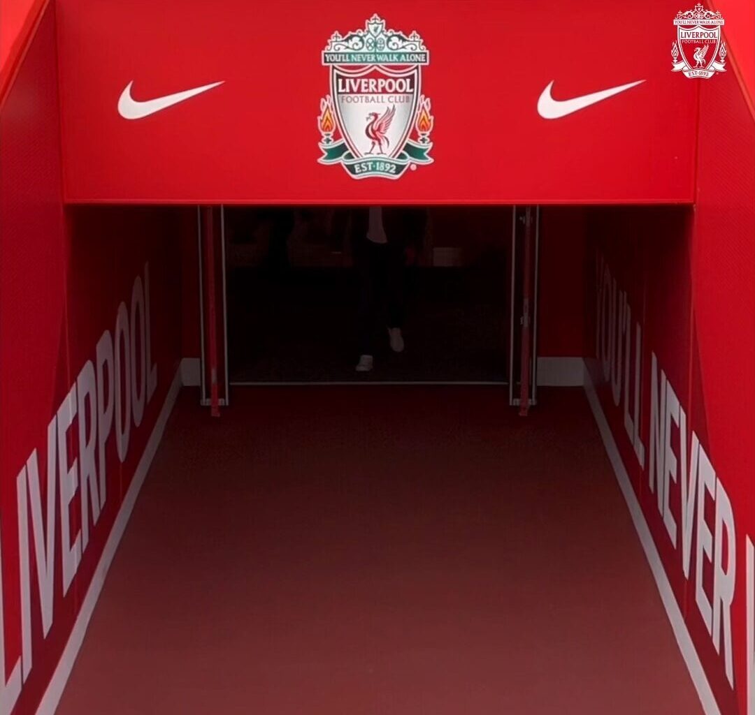 Jürgen Klopp said goodbye to the Liverpool staff by posing for a photo at Anfield with all of them and the trophies they won under him