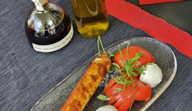 Rostbratwurst (grilled sausage), with what we affectionately call Tomazella (tomatoes with mozzarella di bufala)