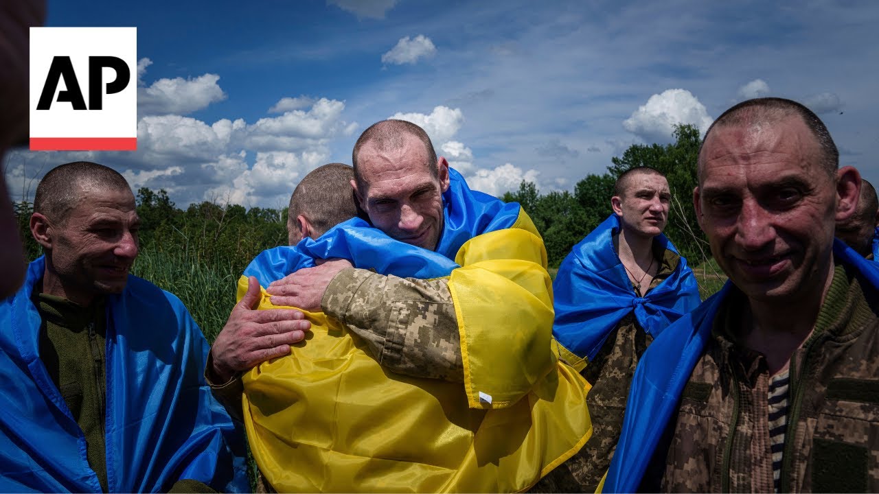 Ukrainian soldiers captured by Russia return home as part of prisoner exchange