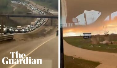 Canada wildfires: huge queues on highway as thousands evacuate oil town