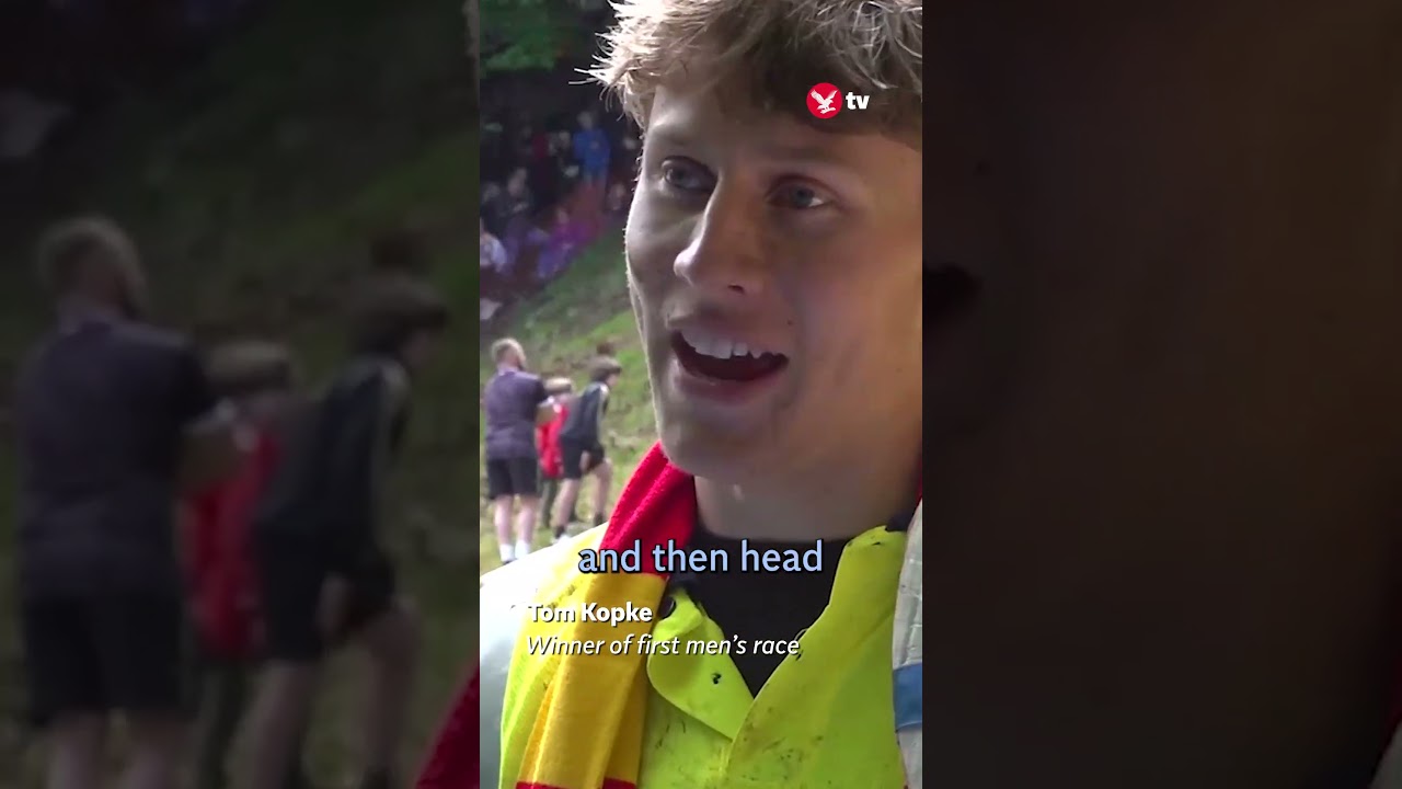 Daredevils attend annual cheese rolling event 🧀 #news #shorts