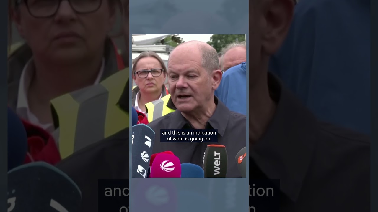 German Chancellor Olaf Scholz visits flood-hit South | DW News
