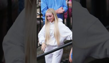 Woman arrested for chucking milkshake at Nigel Farage is unmasked as online model