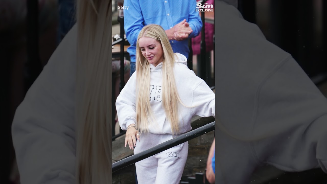 Woman arrested for chucking milkshake at Nigel Farage is unmasked as online model