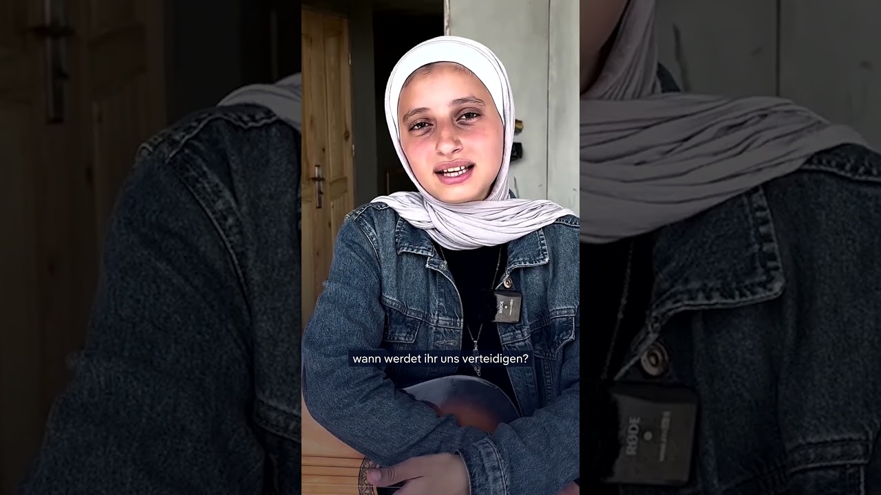 Rafah Nasser spielt Gitarre für die Kinder auf den Straßen Gazas | DW Nachrichten