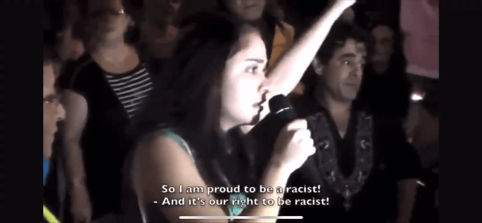"I am proud to be a racist, and it's our right to be racist. If I'm racist to preserve my life then I'm proud " says a woman at a rally