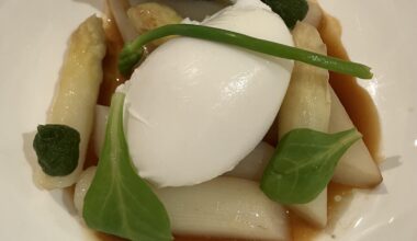 White asparagus with a poached egg