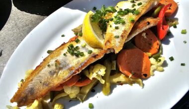 Grilled zander fillets on vegetables (carrots, cauliflower, courgettes, green beans and peppers), Lake Constance, Germany