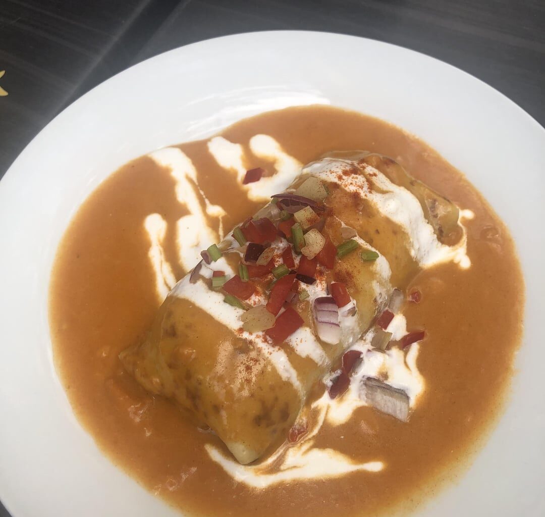 Meat stuffed pancake in paprika sauce, tripe stew with potatoes
