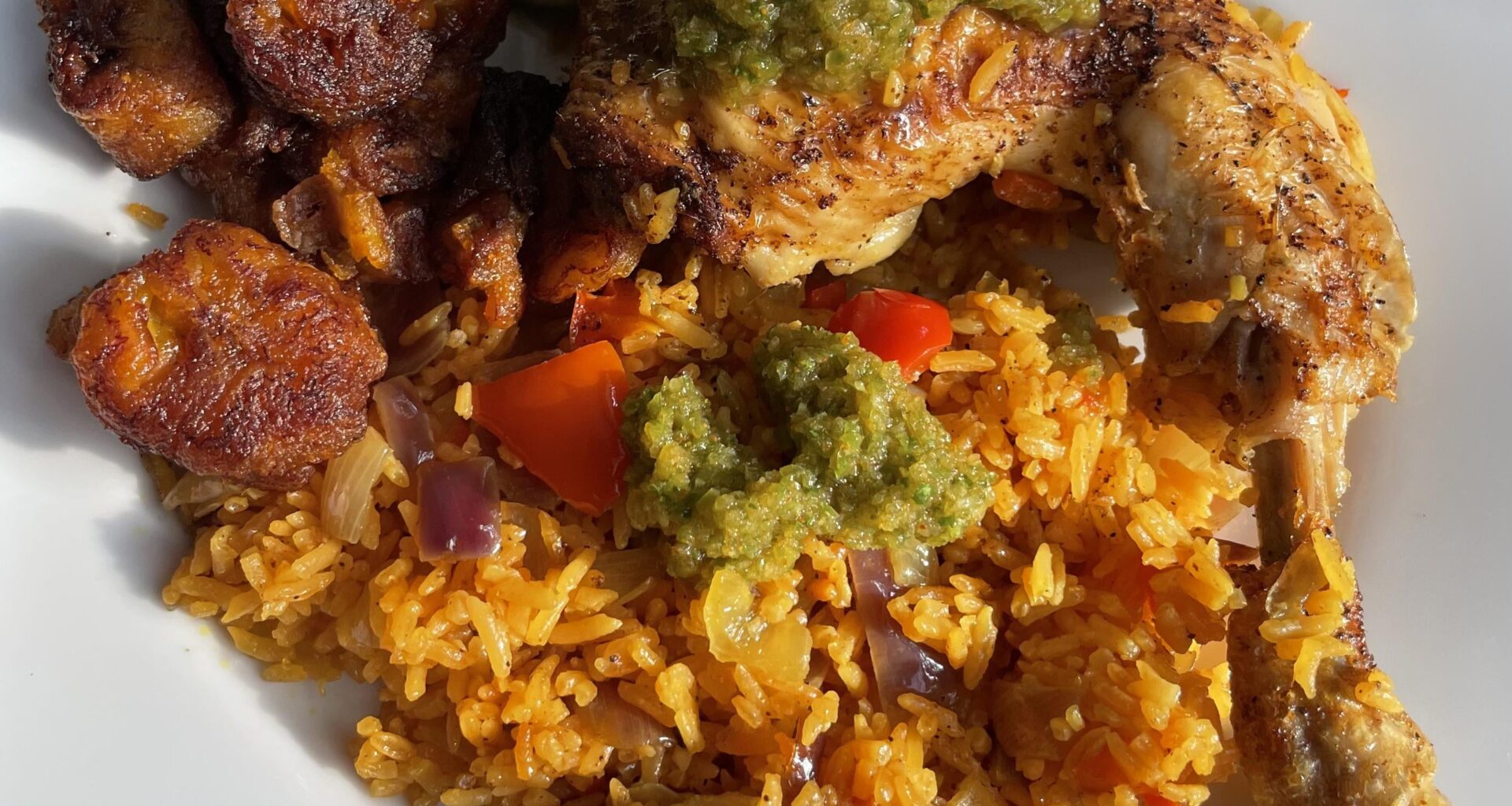 Chicken and rice with fried Plantain and Sofrito in Berlin