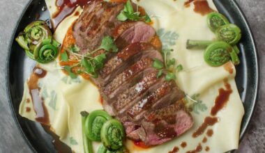 Main Course: Freshly rolled & herb laminated pasta plates, duck breast, passata sauce, fiddleheads & and red-wine reduction butter sauce / Dessert: Naval orange sorbet with a wild berry coulis served in an orange peel cup