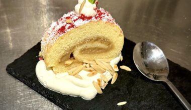 Banana Butter vanilla roulade with sweet whipped cream & toasted almonds