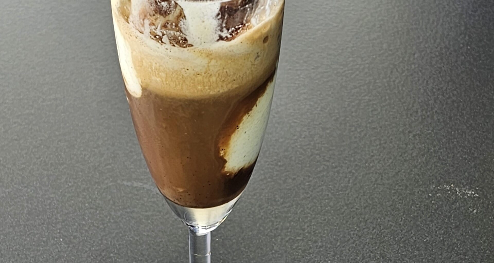 Combatting 32°with an Affocato, consisting of a shot of vanilla syrup, a generous portion of bourbon vanilla ice cream, topped with a hot strong espresso and crowned with some chocolate powder