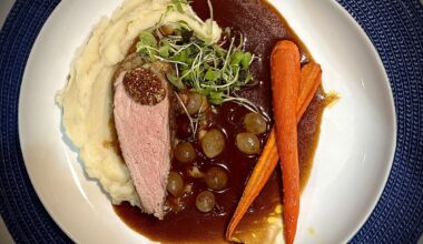 Pork tenderloin, whipped potatoes, red wine sauce with pearl onions & carrots glazed in maple syrup & lemon