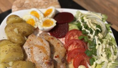 pork loins with buttery jersey potatoes and salad