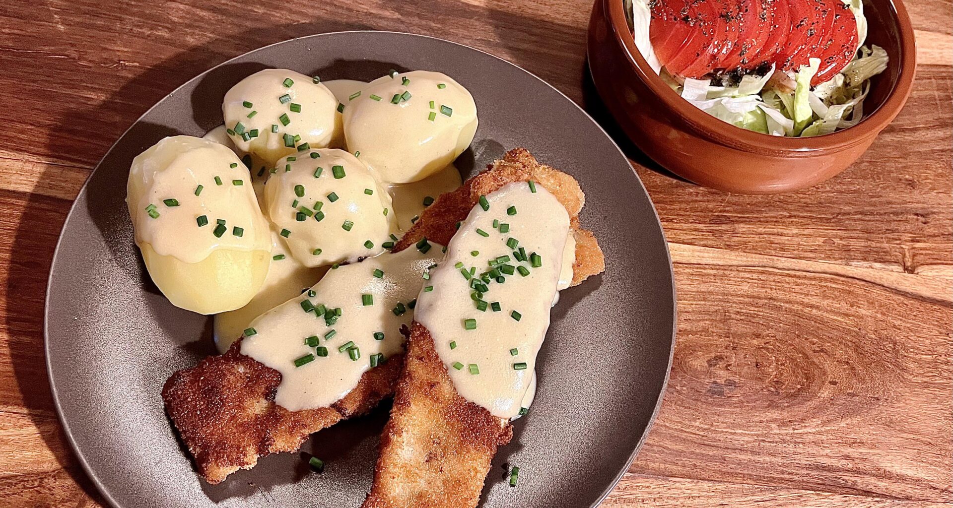 Breaded pollock fillet, potatoes and mustard sauce