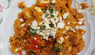 Tomato couscous with feta, olives and basil.