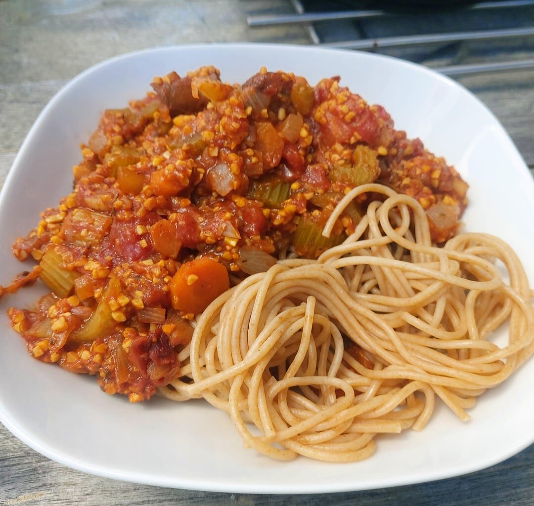 Whole grain apaghetti with lupin bolognese and a side salad.
