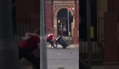 Middlesborough women charging burning wheelie bin into police falls down #shorts