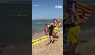 Majorca party beach taken over by protesters playing bagpipes #holiday #marjorca #protests