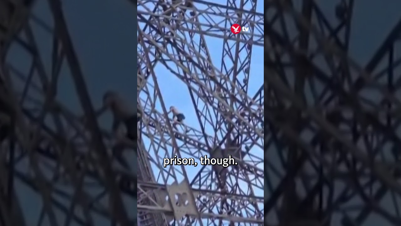 British man caught climbing Eiffel Tower #shorts