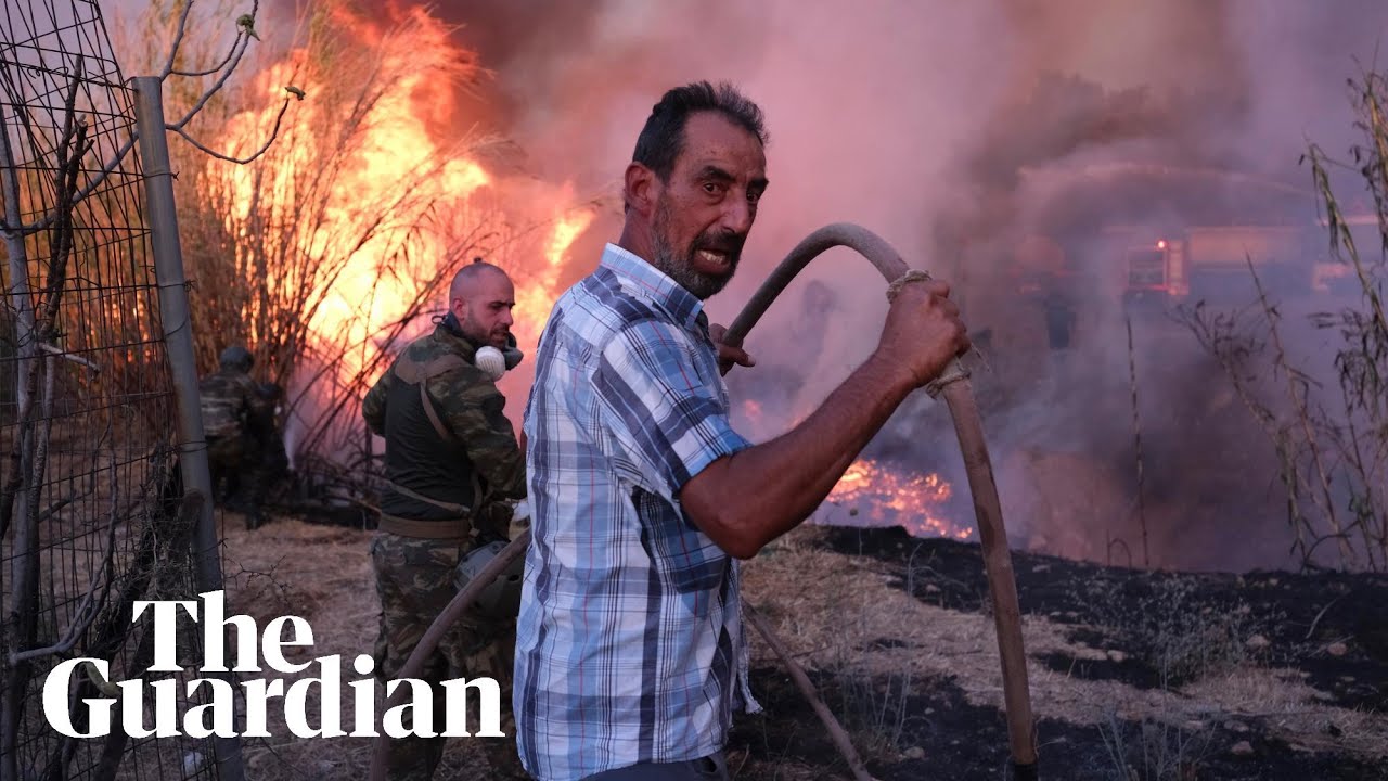Wildfire 'moves like lightning' around Athens forcing residents to evacuate