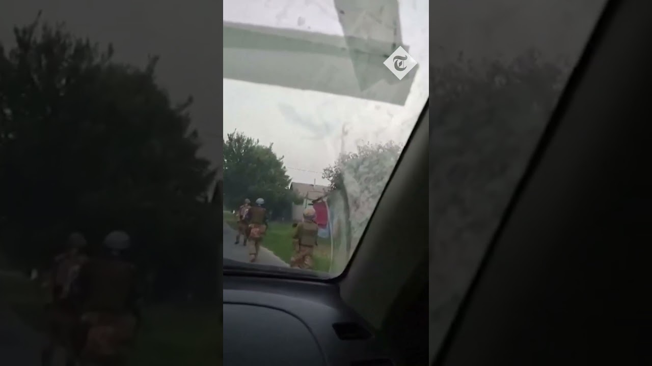Ukrainian troops patrol through village in Kursk following invasion