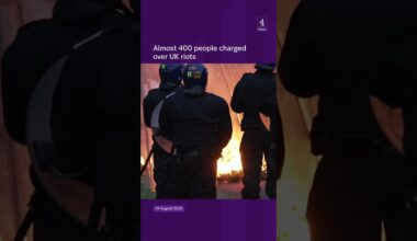Nearly 400 people charged over riots