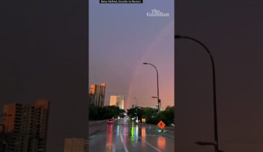 Moment lightning strikes around rainbow in Minneapolis storm