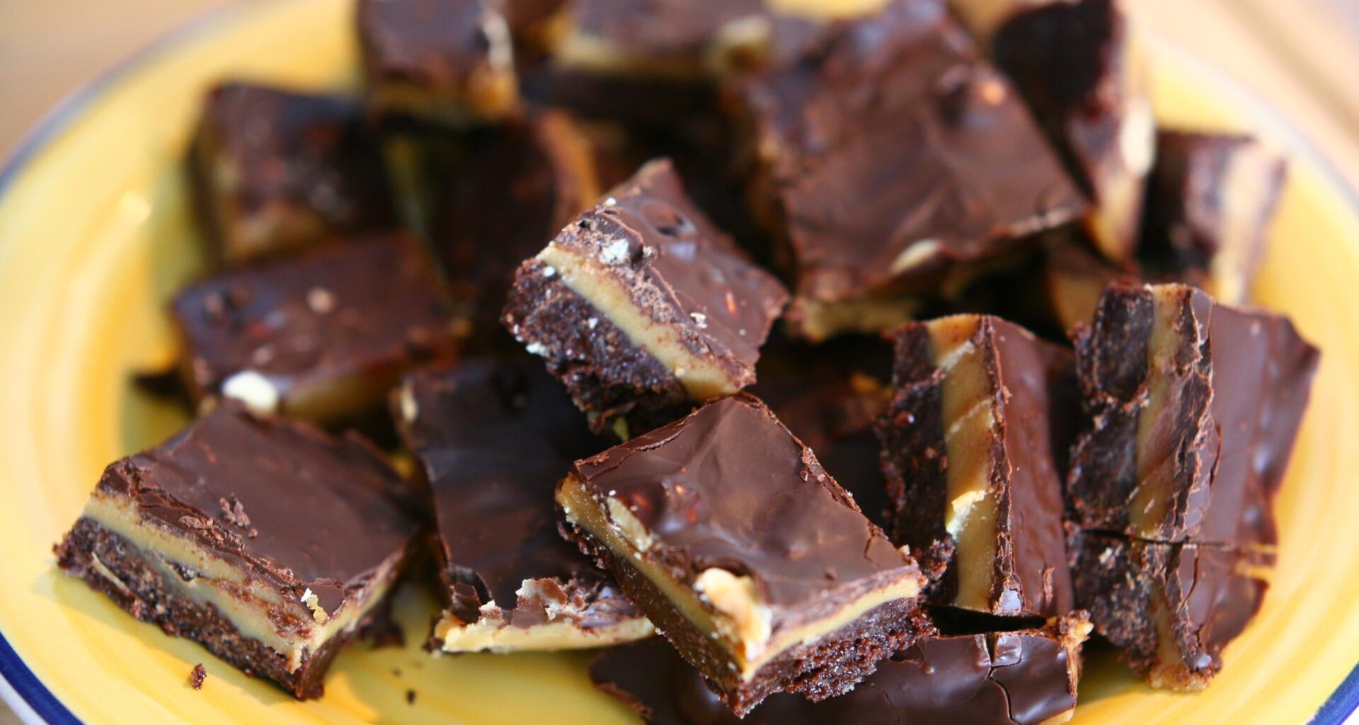 Chocolate and hazelnut caramel bars with peanuts