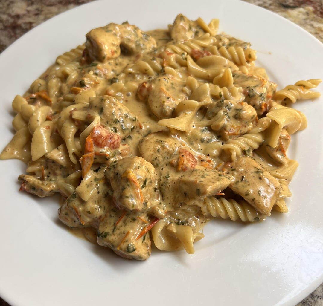 Flavorful Chicken Pasta with a Creamy, Sun-Dried Tomato Sauce
