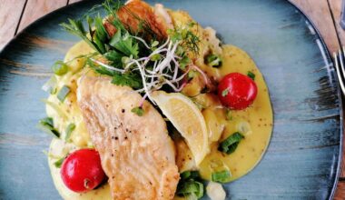 Cod with mashed potatoes on sweet mustard sauce