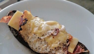 toasted whole grain bread with bacon and cheese baked fried egg