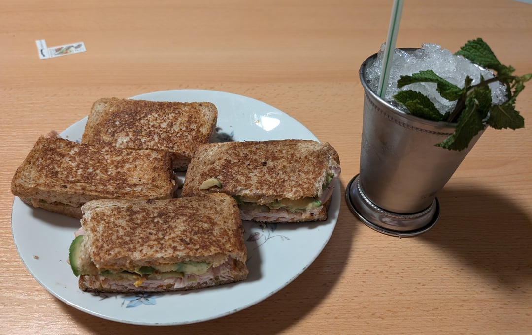 Homemade turkey ham and avocado sandwiches.