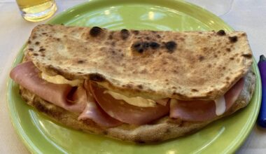Open calzone, with mortadella, stracciatella and lemon zest!