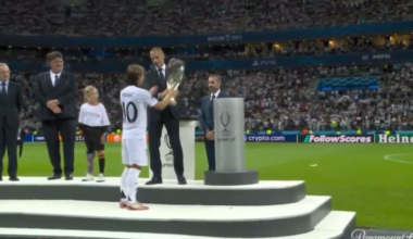 Luka Modrić lifts the UEFA Super Cup trophy, becoming the most decorated player in Real Madrid history with 27 trophies.